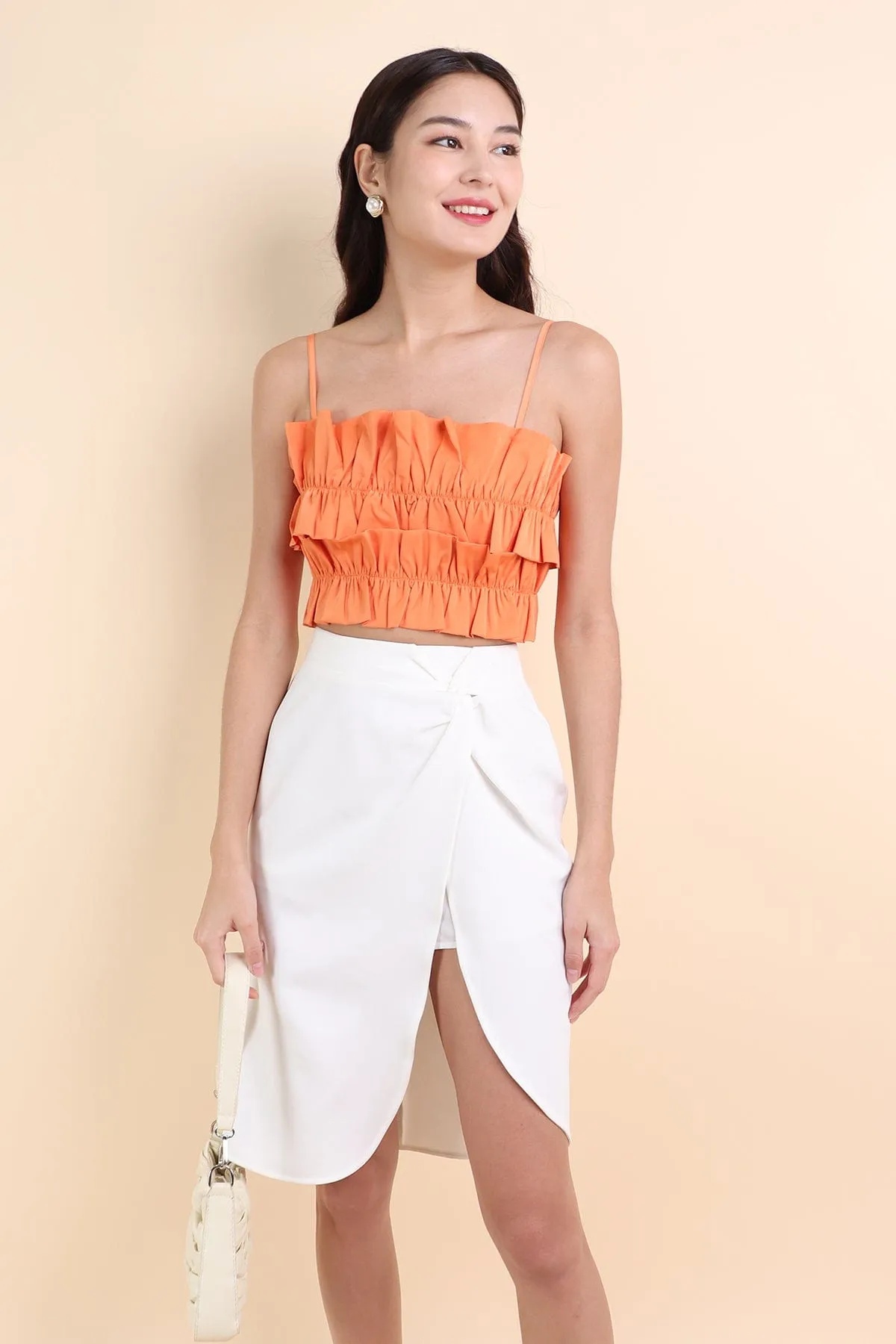 KINSLEY ASYMMETRICAL MIDI SKIRT IN WHITE