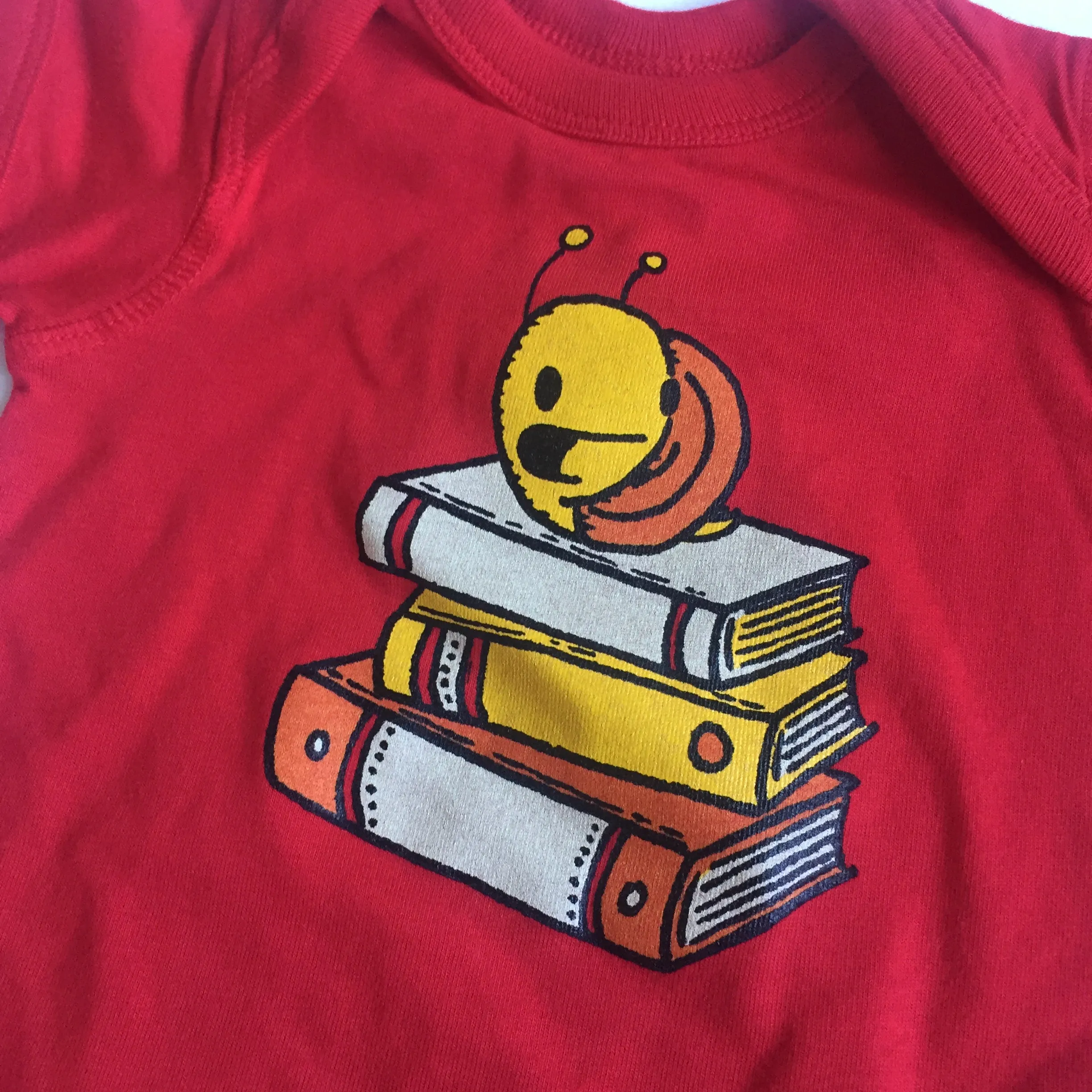 snail with books one piece bodysuit